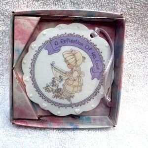 Precious moments ornament a reflection of his love